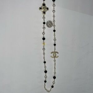 New!  Chanel long chain pearl necklace.